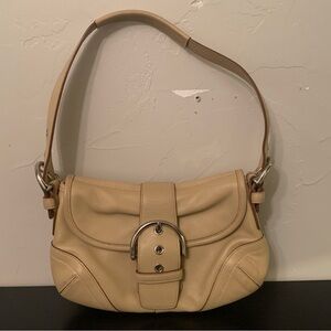 Light Tan Coach Soho Flap Bag